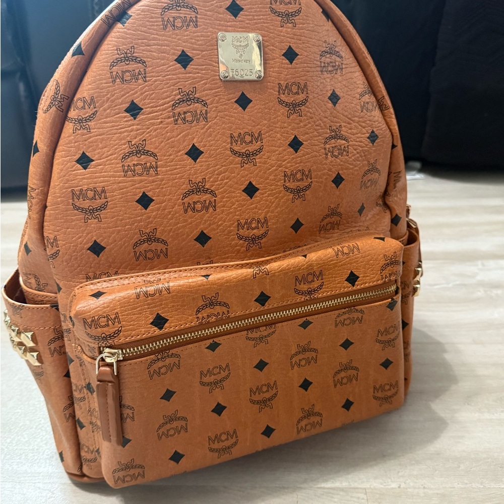 MCM Brown Backpack with Iconic Monogram Design